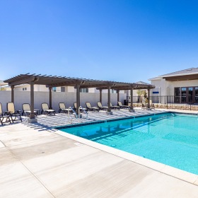Swimming Pool Large sparkling pool with sundecks and ample lounge chairs.