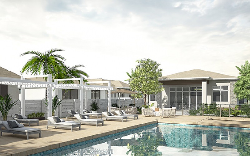 Spacious sparkling pool with sundecks and cabanas for lounging.